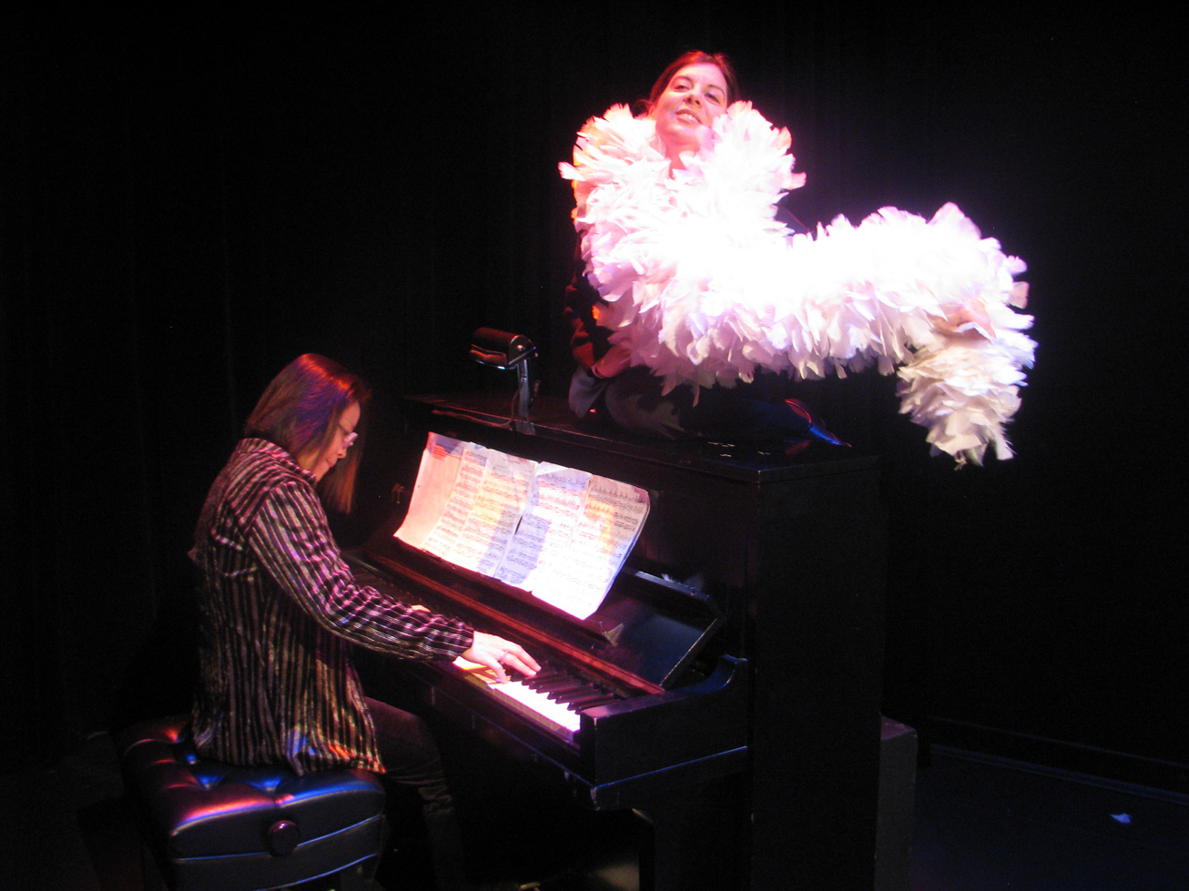 Melissa with boa and Shoko on piano